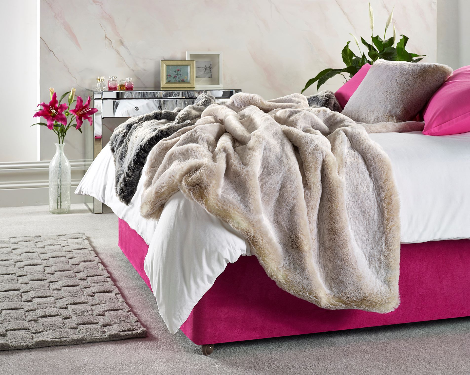 Faux Fur Throws decorating a bed